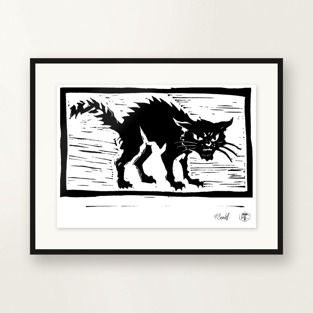 Cat — hand-printed linocut in landscape format, framed on the wall