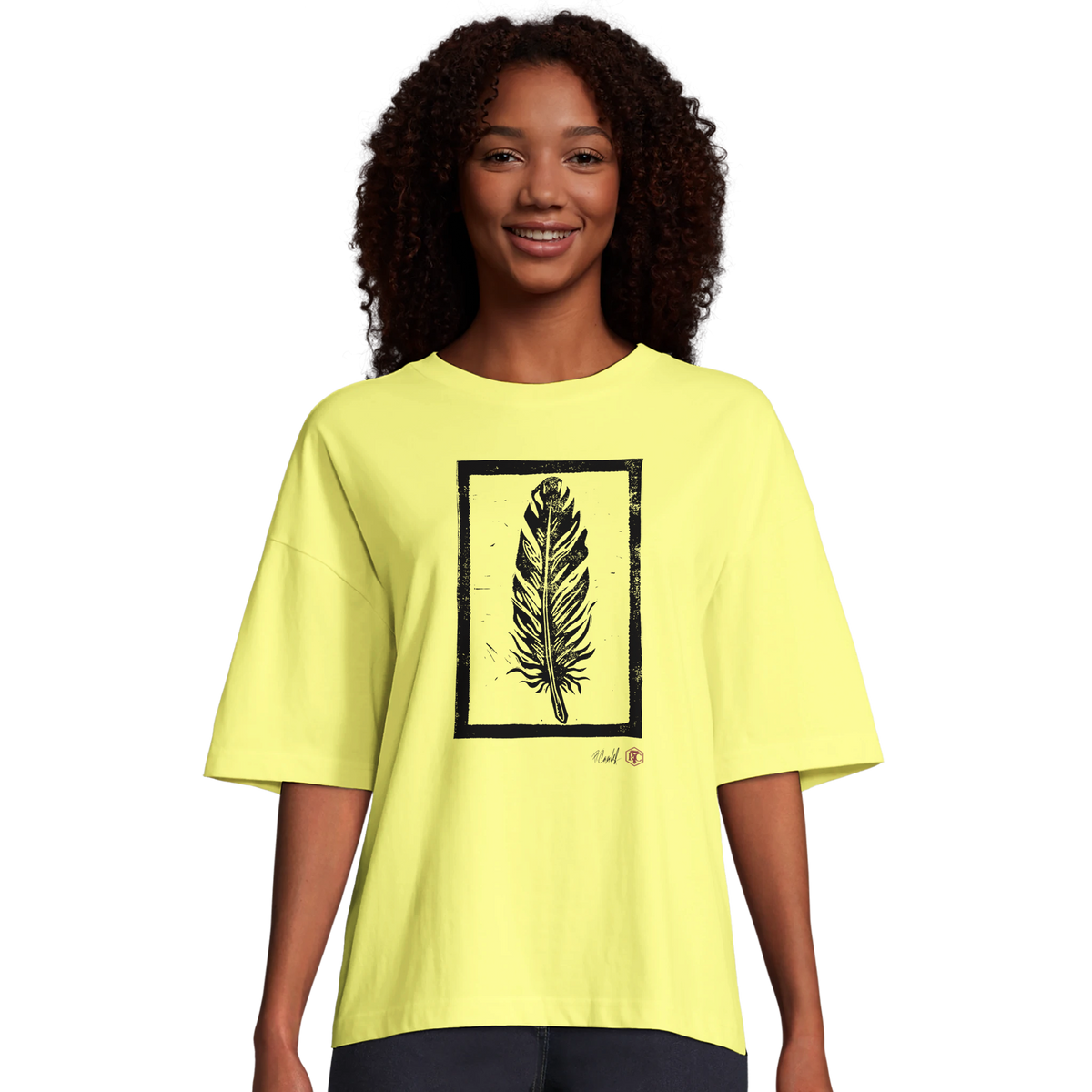 Model wearing T-shirt “Feather”, light yellow, women’s cut – front view