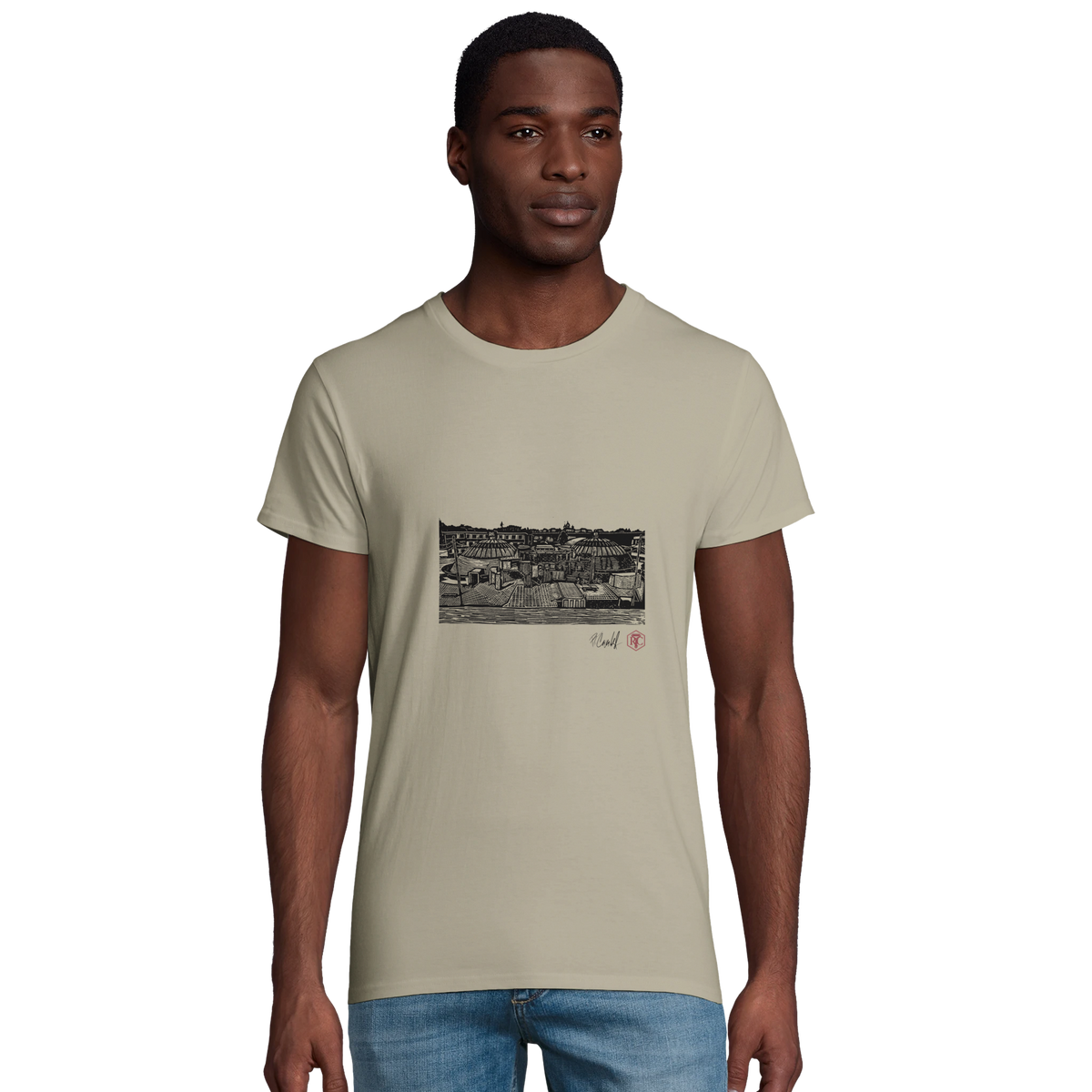 Model wearing T-shirt “The Domes”, sand, men’s cut – front view
