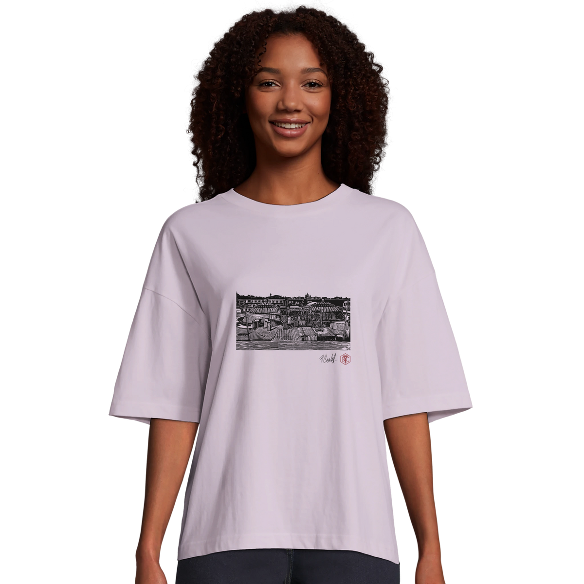 Model wearing T-shirt “The Domes”, lilac, women’s cut – front view