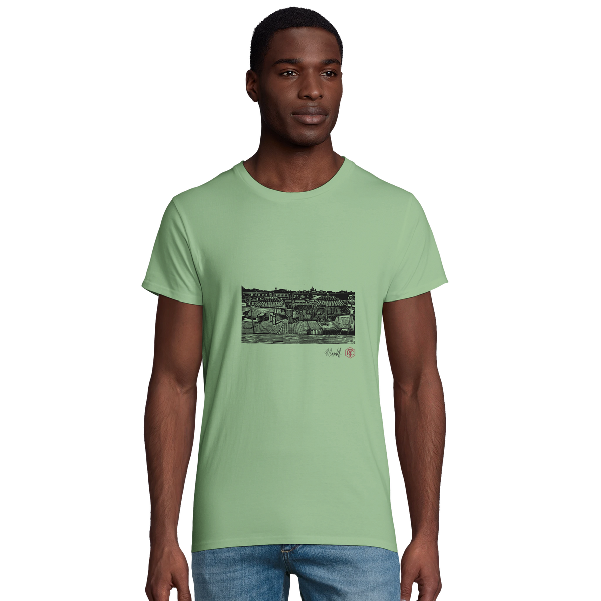Model wearing T-shirt “The Domes”, apple green, men’s cut – front view