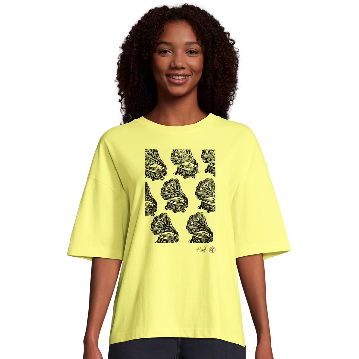 Model wearing T-shirt “Gramophones”, light yellow, women’s cut – front view