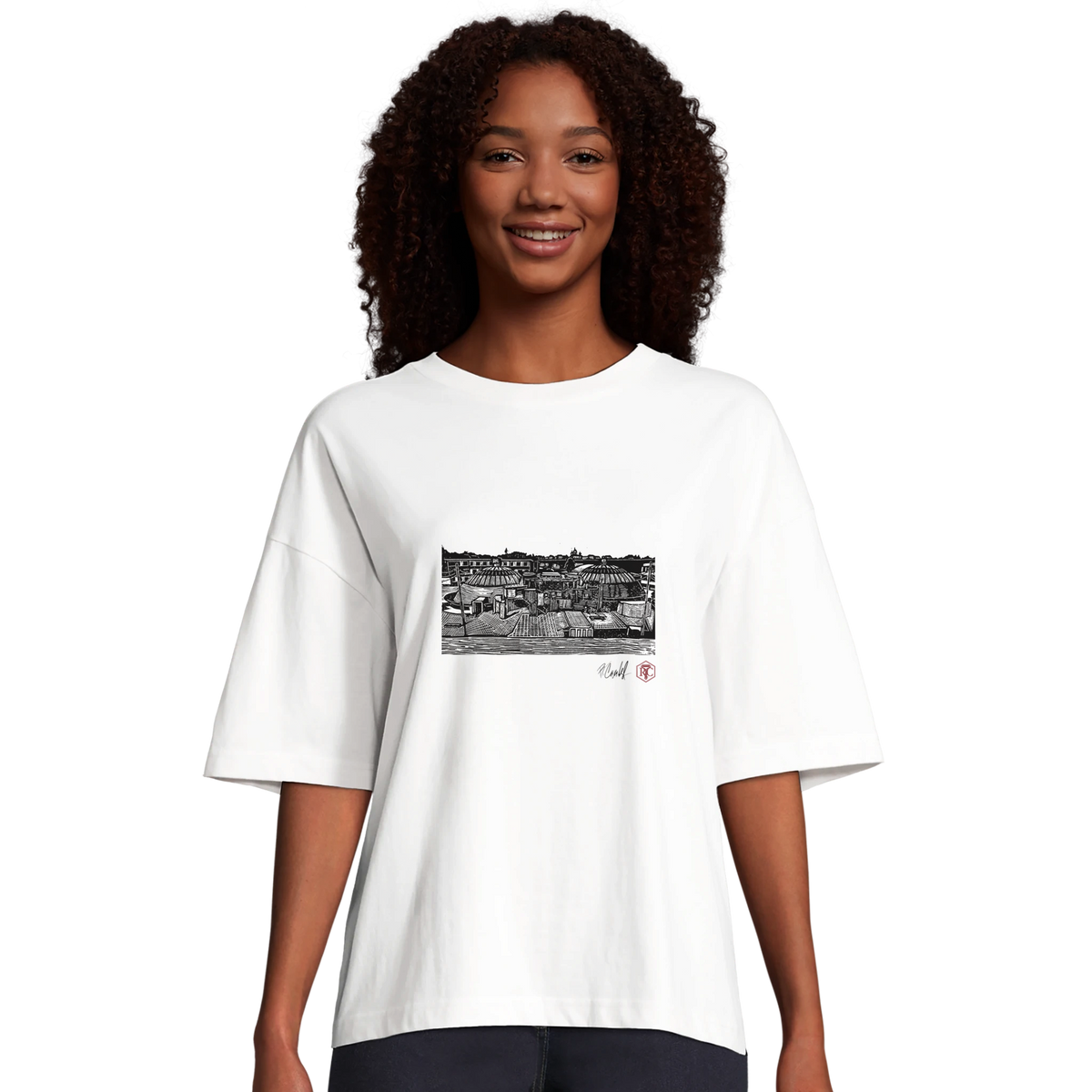 Model wearing T-shirt “The Domes”, white, women’s cut – front view