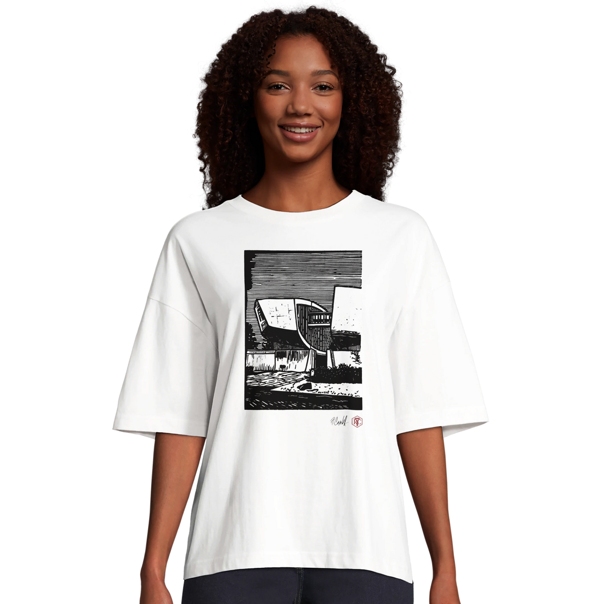 Model wearing T-shirt “SNP”, white, women’s cut – front view