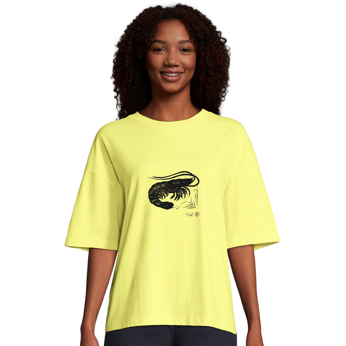 Model wearing T-shirt “Shrimp”, light yellow, women’s cut – front view