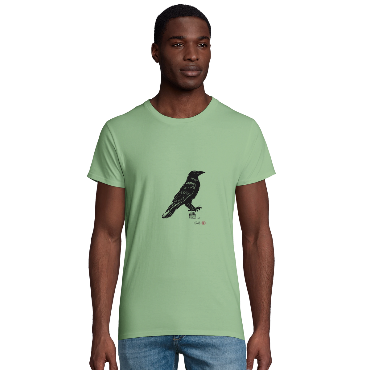 Model wearing T-shirt “Raven”, apple green, men’s cut – front view