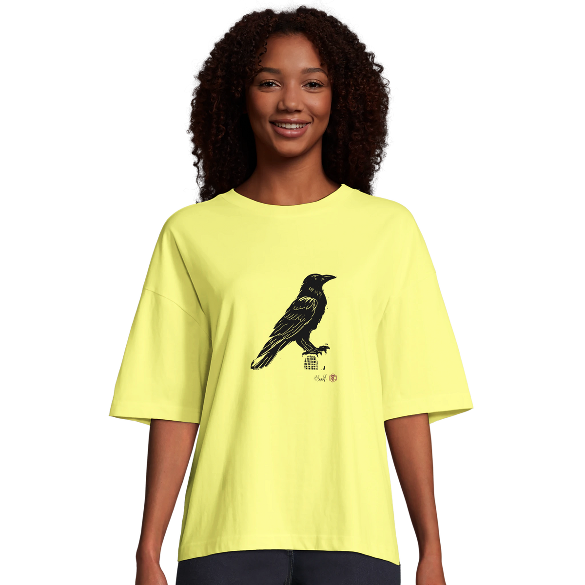 Model wearing T-shirt “Raven”, light yellow, women’s cut – front view