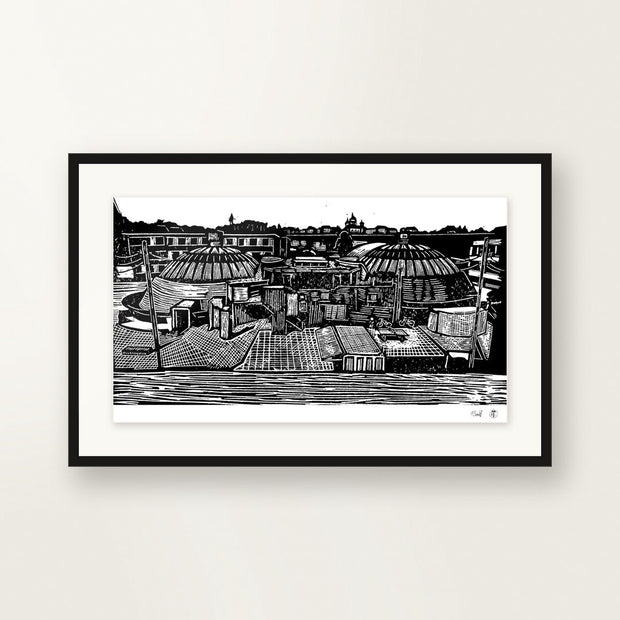 The Domes — original linocut A4, framed on the wall