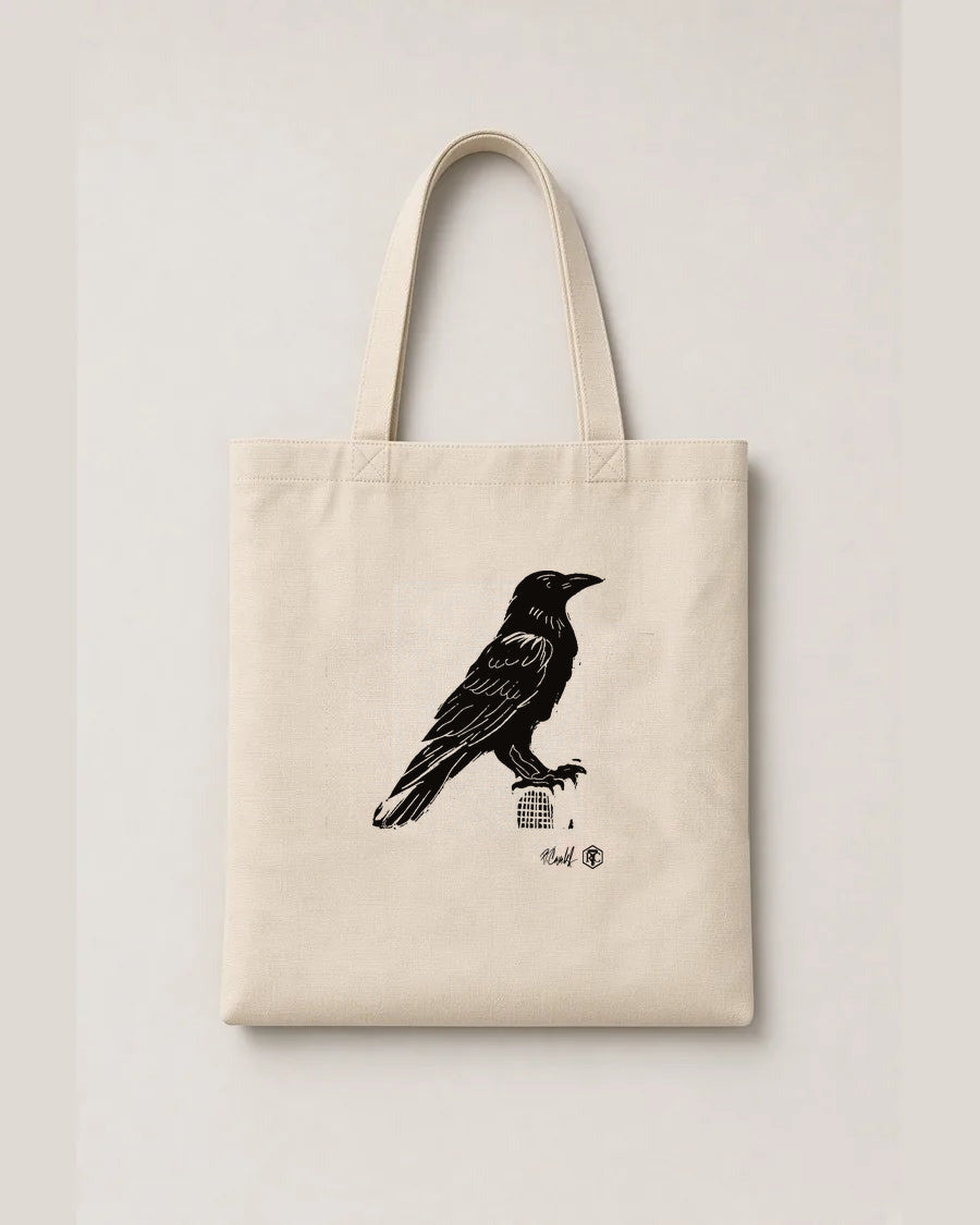 Raven — linocut on an organic cotton tote bag, natural colour